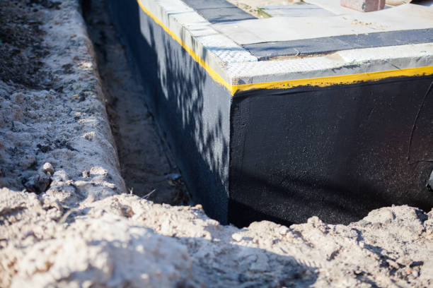 Professional Exterior Waterproofing technician working in Oakdale, MN